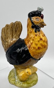 lot 971 image: Beatrix Potter Book Trio and Two Figurines