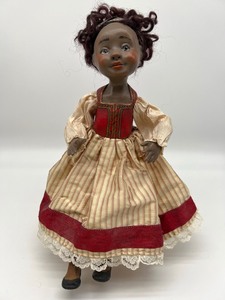 lot 1003 image: Lucia Friedericy Sitting Doll Figurine