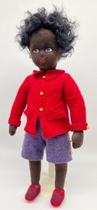 lot 1033 image: Little Black Sambo and the Tiger Kitten Book, Artisan Doll and Tiger by Patty Gohman