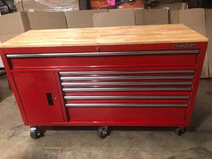 lot 47 image: Husky 61 in. W x 22.1 in D Standard Duty 7-Drawer 1-Door Mobile Workbench Tool Chest with Solid Wood Top in Gloss Red  slight scratches customer returns see pictures