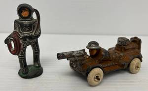 Two 1930s Barclay Manoil Metal Toys Including Gunner Laying Down ( Rubber Tires Have Cracks) And Diver (Diver Has Holes)