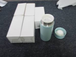 6 Mini Thermos Bottles...
