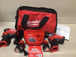lot 36 image: Milwaukee M12 FUEL 12V Lithium-Ion Brushless Cordless Hammer Drill and Impact Driver Combo Kit w2 Batteries and Bag (2-Tool) customer return see pictures