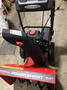 lot 49 image: Power Smart  24 in. 2-Stage Electric Start Gas Snow Blower with LED Light in working condition see pictures