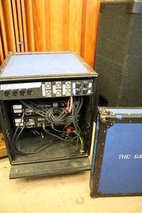 lot 911 image: Rolling Rack-Mount Storage Box with (2) Crown Powertech 2 and (1) JBL M552 Variable Crossover