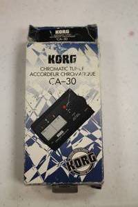 lot 1011 image: Korg CA-30 Chromatic Tuner (in original packaging)
