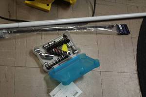 lot 994 image: Lot of (2) Curtain Rods with Bin Of Tools - Sockets