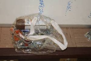 lot 1002 image: Lot of (1 Bag) Misc. Hardware - Brackets, Bolts, Rustoleum Spray Paint, Misc. Hardware