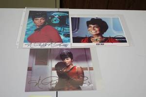 lot 1017 image: Lot of (3) Star Trek Michelle Nichols Signed Photos (in sleeves)
