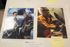 lot 1083 image: Lot of (2) Battlestar Galactica Signed Photos (in sleeves)