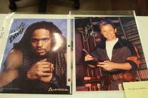 lot 1020 image: Lot of (2) Andromeda Signed Photos (in sleeves)