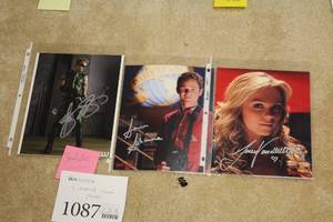 lot 1087 image: Lot of (3) Smallville Signed Photos (in sleeves)