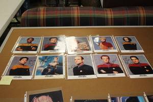 lot 1106 image: Lot of (10) Star Trek Voyager Signed Photos (in sleeves)