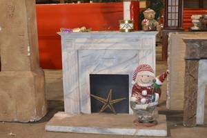 Staging fireplace mantle with toys and decor