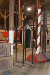 Quantity of 4 black backdrop channel stands 123 tall