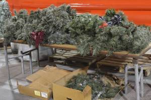 Garland on top of table top and box below table