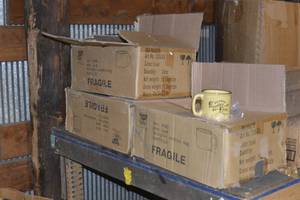 3 boxes of new yellow coffee mugs
