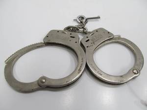 lot 9 image: Working Vintage SMITH & WESSON Handcuffs wKey