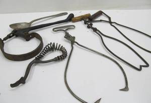 lot 36 image: Group of Antique Tools Advertising Ice Tongs etc