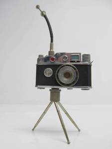 lot 74 image: Very Cool Vintage Cont-Lite Camera Cigarette Lighter wTripod Stand