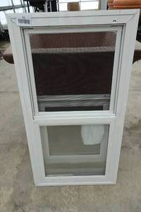 lot 232 image: Lippert Vinyl Frame Single Hung Dual Glazed Window