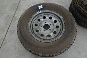 lot 214 image: Provider Radial ST ST20575R15 Trailer Tire with Wheel