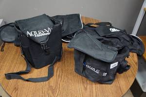 lot 18 image: Assorted Sporting Goods Bags - Aqua-Vu, Aqua Cam, Beckman