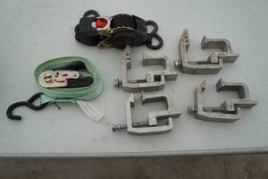 lot 205 image: 4 Topper Clamps and 2 Ratchet Straps