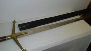 Sword looks a Knights Templar Sword. 51.25 in Long