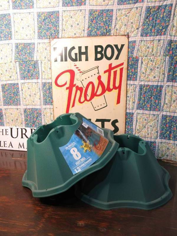 lot 702 image: Jack Post 8 Plastic Christmas Tree Stand, Set of 2