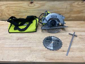 lot 1 image: RYOBI 15 Amp Corded 7-14 in. Circular Saw with Bag
