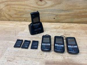 lot 138 image: HONEYWELL 60S Dolphin Homebase with 4 Dolphin Handheld Computers