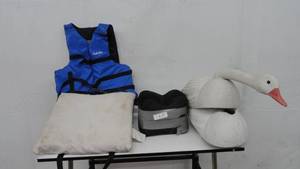 lot 29 image: Sporting Goods  Life vests, shooting rest, goose decoys