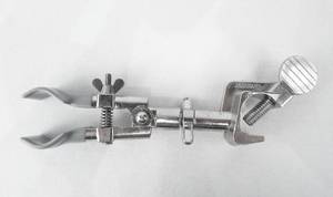 lot 91 image: Set of 4 Mercer Glass Works Neverust Burette Clamps - Made in Japan