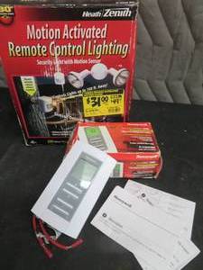 lot 50 image: NEW THERMOSTAT AND MOTION DETECTOR LIGHT