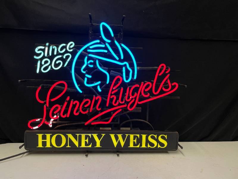 lot 204 image: Leinies Honeyweiss with maidenhead, Since 1867, neon