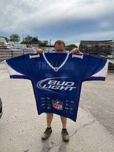 lot 156 image: Bud Light football jersey shaped flag