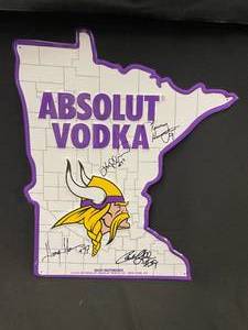 lot 122 image: MN Vikings autographed Absolut Vodka tin tacker