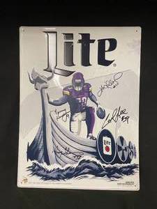 lot 123 image: MN Vikings autographed Miller Lite tin tacker