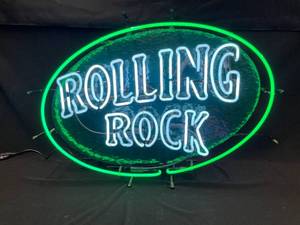 lot 182 image: Rolling Rock neon sign with ice cube effect background