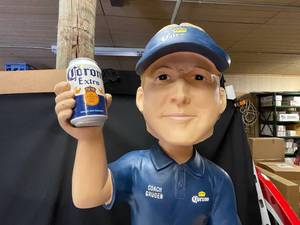 lot 11 image: John Gruden giant talking bobblehead