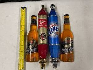 lot 215 image: Lot of 4 Miller tap handles