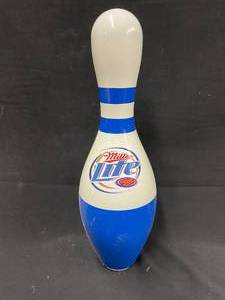 lot 261 image: Miller Lite bowling pin with logo