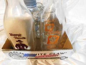 lot 187 image: Vintage milk bottles and fruit jars