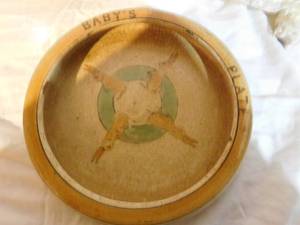 lot 184 image: 3 porclean dolls, antique Roseville baby dish, Little bo-Peep cup