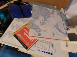 lot 215 image: Box of advertised items, maps and more