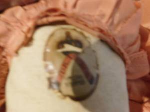 lot 213 image: Antique leather body doll w stand