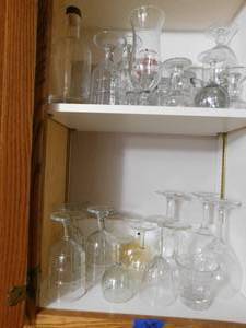 lot 204 image: Cupboard of bar glasses