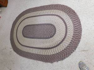 lot 199 image: oval braided rug