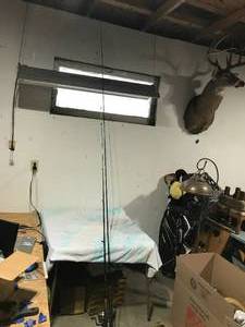 lot 105 image: 2 fishing rods and reels